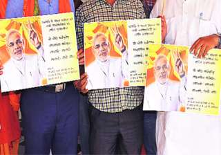 bjp poster in varanasi eulogizing modi as ya modi... bjp poster in varanasi eulogizing modi as ya modi...