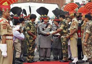 bsf pak rangers exchange eid sweets at wagah in... bsf pak rangers exchange eid sweets at wagah in...