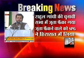 dehradun youth throws shoe at rahul gandhi during... dehradun youth throws shoe at rahul gandhi during...
