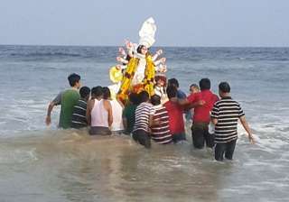 durga puja ends in bengal with immersion of idols... durga puja ends in bengal with immersion of idols...