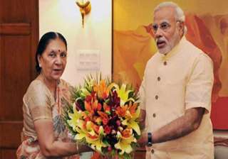 gujarat cm thanks pm for increase in height of... gujarat cm thanks pm for increase in height of...