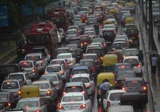 heavy rains in delhi traffic snarls in several... heavy rains in delhi traffic snarls in several...
