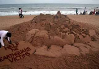 sand artist s message for helping earthquake... sand artist s message for helping earthquake...