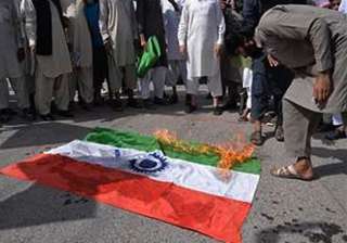 protesters burn indian flag in pok against... protesters burn indian flag in pok against...