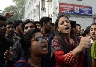 students protest outside police station over... students protest outside police station over...