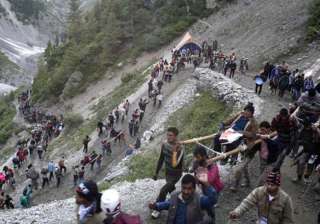 frightened villagers reluctant to return home in... frightened villagers reluctant to return home in...