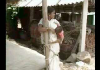 orissa villagers torture dalit woman child by... orissa villagers torture dalit woman child by...