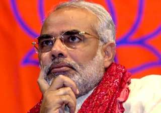 modi seeks apology from pm on pc s saffron terror... modi seeks apology from pm on pc s saffron terror...