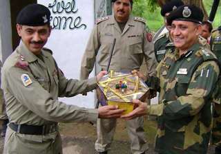 indian pakistani armies exchange sweets on loc -... indian pakistani armies exchange sweets on loc -...