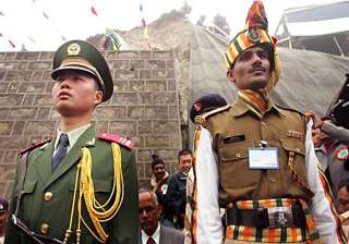 indian chinese troops exchange beer rasgullas... indian chinese troops exchange beer rasgullas...