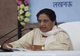 mayawati attacks ec for covering statues of bsp s... mayawati attacks ec for covering statues of bsp s...