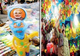 modi kejriwal pichkari battle hots up before holi... modi kejriwal pichkari battle hots up before holi...