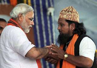 modi begins his day long sadhbhavana fast in... modi begins his day long sadhbhavana fast in...