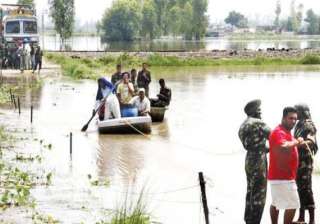 ndrf carries out rescue work in flood hit... ndrf carries out rescue work in flood hit...