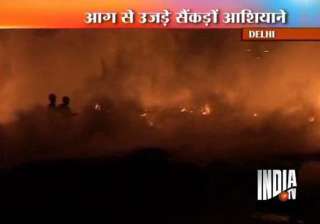 nearly 500 slum huts gutted in delhi fire - India... nearly 500 slum huts gutted in delhi fire - India...