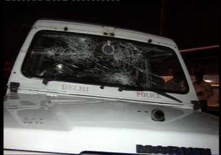 mob torches police vehicles in west delhi 19... mob torches police vehicles in west delhi 19...