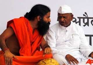 ramdev backtracks says no problem with bhushans... ramdev backtracks says no problem with bhushans...