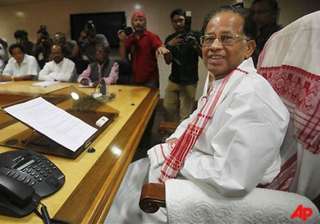 tarun gogoi sworn in assam cm for third term -... tarun gogoi sworn in assam cm for third term -...