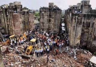 11 dead in vadodara building collapse probe... 11 dead in vadodara building collapse probe...