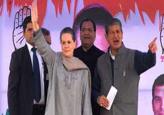 uttarakhand cm rawat compares sonia rahul with... uttarakhand cm rawat compares sonia rahul with...