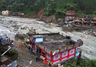 uttarakhand scores of houses washed away in... uttarakhand scores of houses washed away in...