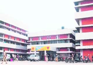 woman delivers baby outside hospital ward in... woman delivers baby outside hospital ward in...