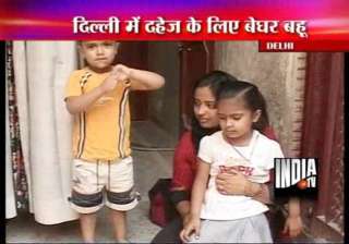 woman stages dharna outside in laws house - India... woman stages dharna outside in laws house - India...