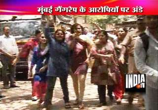 women hurl eggs at mumbai gang rape accused... women hurl eggs at mumbai gang rape accused...
