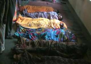 women lie on floor in mathura after undergoing... women lie on floor in mathura after undergoing...