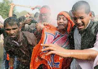 bjp workers cane charged in uttar pradesh - India... bjp workers cane charged in uttar pradesh - India...