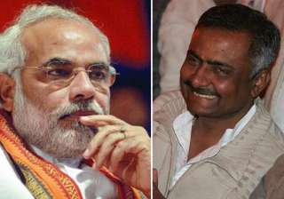 bjp s poster war moves on to rajkot - India TV bjp s poster war moves on to rajkot - India TV