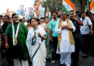 cpi m complains against tmc for using dhoni s... cpi m complains against tmc for using dhoni s...
