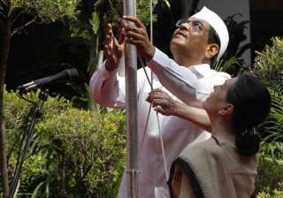 congress president hoists national flag at party... congress president hoists national flag at party...