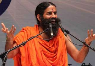 gujarat activist says ramdev flouted poll code... gujarat activist says ramdev flouted poll code...