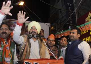 delhi polls on campaign trail for bjp sidhu... delhi polls on campaign trail for bjp sidhu...