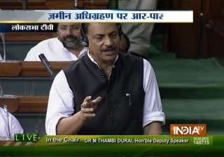 opposition creates uproar in lok sabha over land... opposition creates uproar in lok sabha over land...
