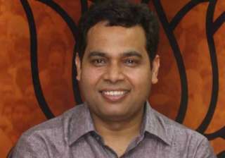 bjp hails modi for jandhan scheme getting entry... bjp hails modi for jandhan scheme getting entry...