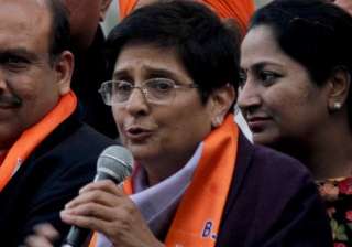 kiran bedi s hoarding vandalised outside bjp... kiran bedi s hoarding vandalised outside bjp...