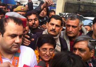 delhi polls bedi puts bjp scarf around lala... delhi polls bedi puts bjp scarf around lala...