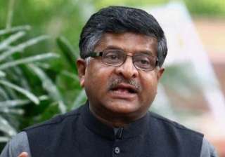 bjp slams rahul gandhi for describing nda govt as... bjp slams rahul gandhi for describing nda govt as...