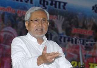 nitish takes dig at modi for trumpeting on... nitish takes dig at modi for trumpeting on...