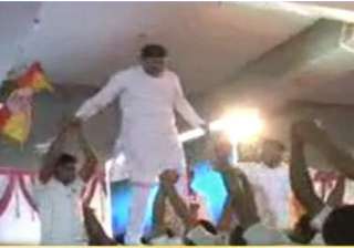 video shows bjp ls candidate walking on backs of... video shows bjp ls candidate walking on backs of...