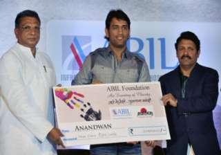 dhoni hands over rs 3 cr to baba amte s ngo -... dhoni hands over rs 3 cr to baba amte s ngo -...