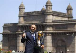 dhoni sports a bald look after wc triumph - India... dhoni sports a bald look after wc triumph - India...