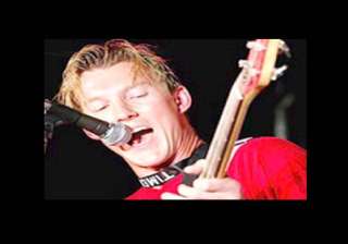 brett lee comes to india holding a guitar - India... brett lee comes to india holding a guitar - India...