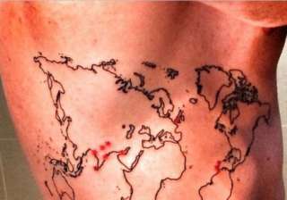 kevin pietersen inks body with a world map -... kevin pietersen inks body with a world map -...