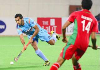hockey midfielder dharamvir reaches 100... hockey midfielder dharamvir reaches 100...