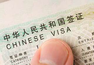 beijing defends stapled visas says policy... beijing defends stapled visas says policy...