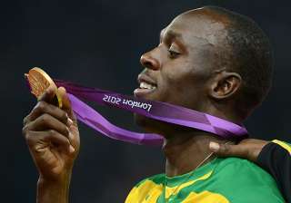 bolt gets another golden triple with relay win -... bolt gets another golden triple with relay win -...