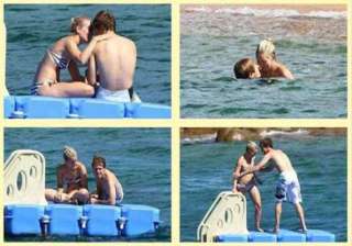 f1 racer vettel gets cozy with his girlfriend at... f1 racer vettel gets cozy with his girlfriend at...